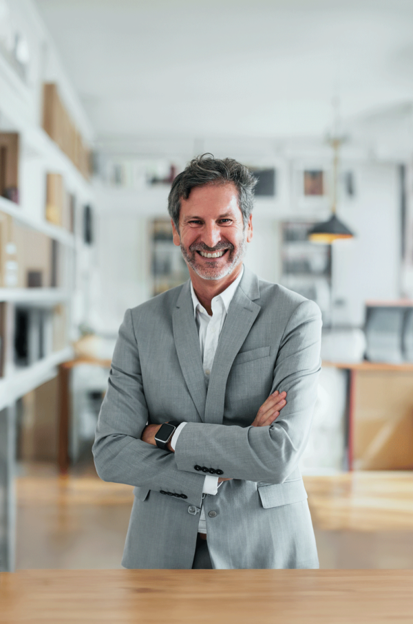 Man in Gray Suit Working as an Executive Client with Valiant Career